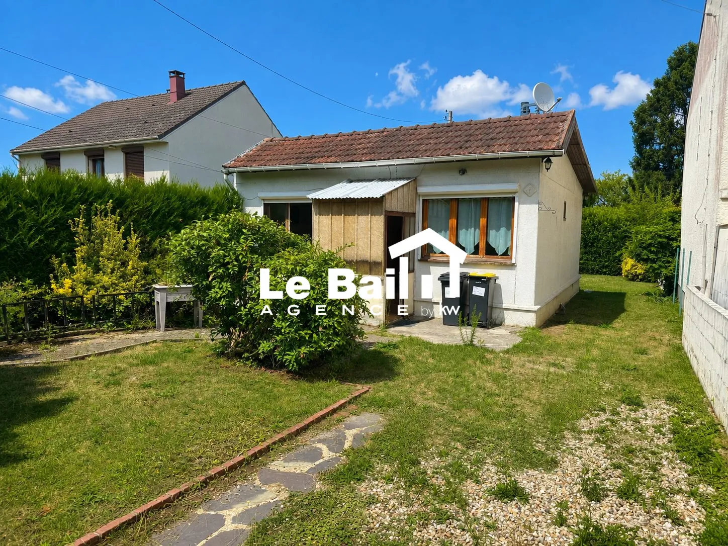 Maison à vendre à Osny avec grand terrain et potentiel de rénovation
