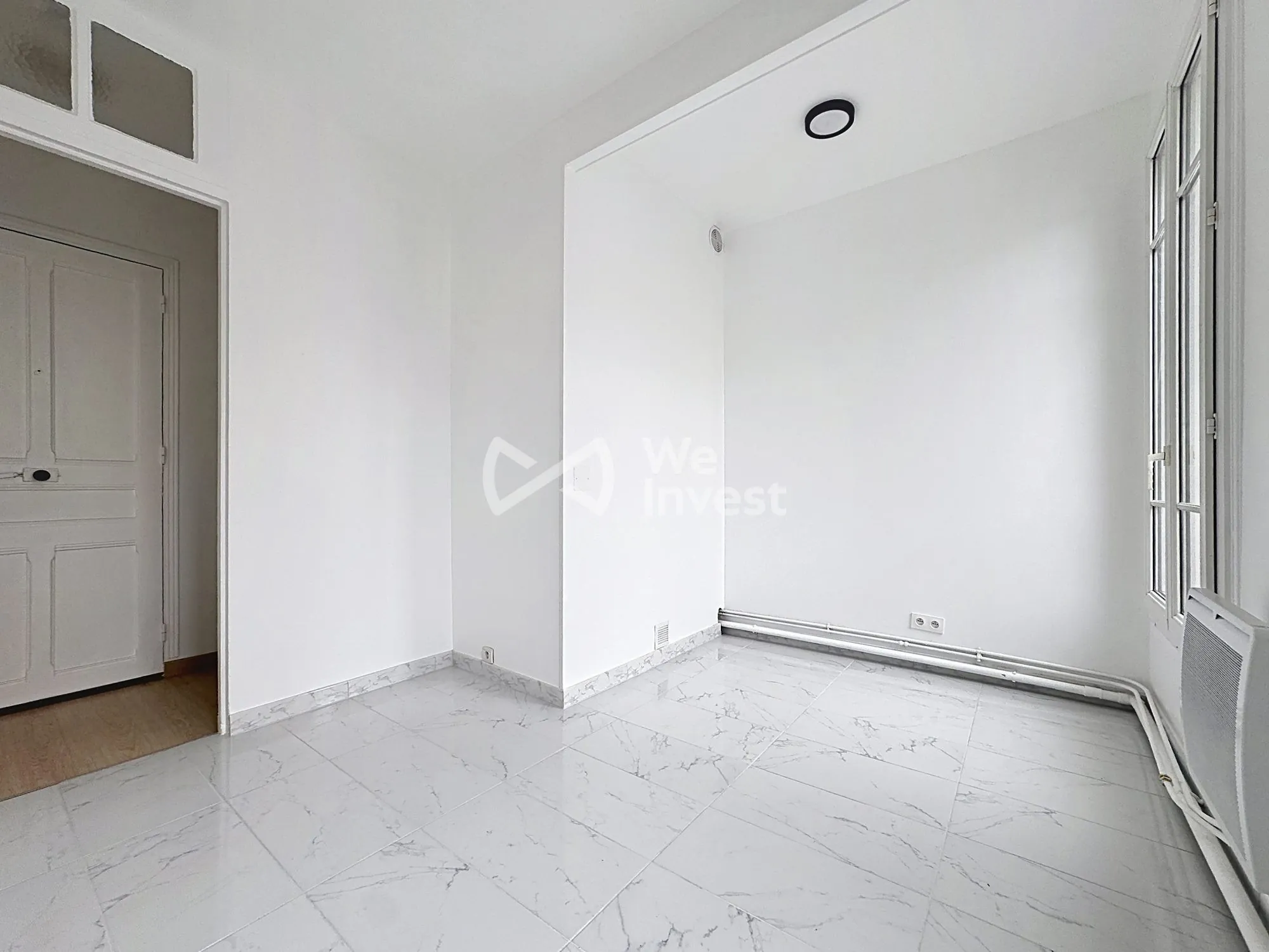 Appartement T2 rénové en centre-ville de Colombes avec cave 