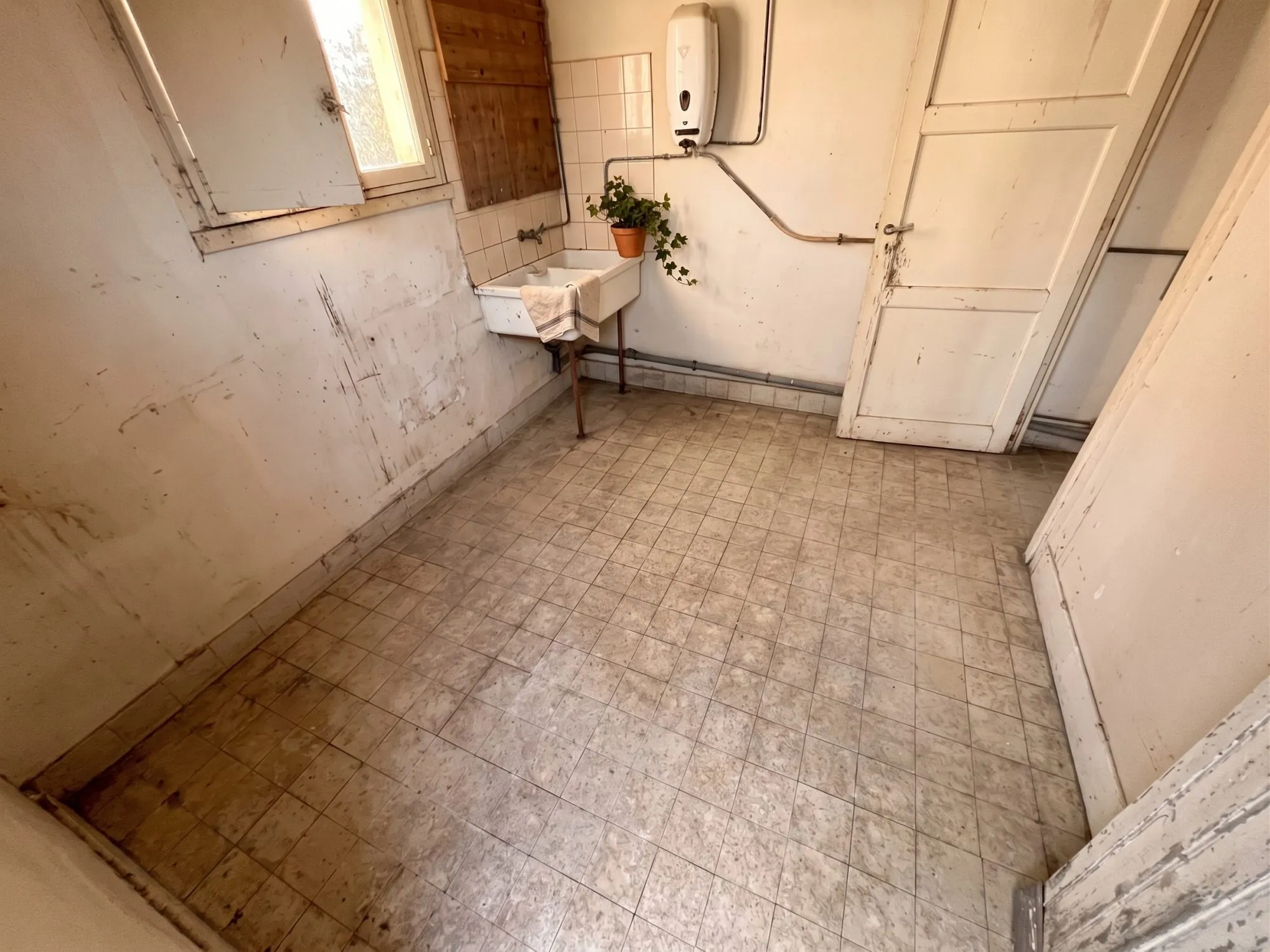 Appartement à rénover avec terrasse en plein centre de Chateaubriant