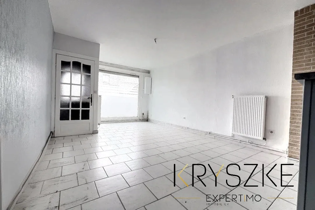 Maison à rénover de 95 m² à Carvin avec jardin et garage - Investissement ou résidence principale