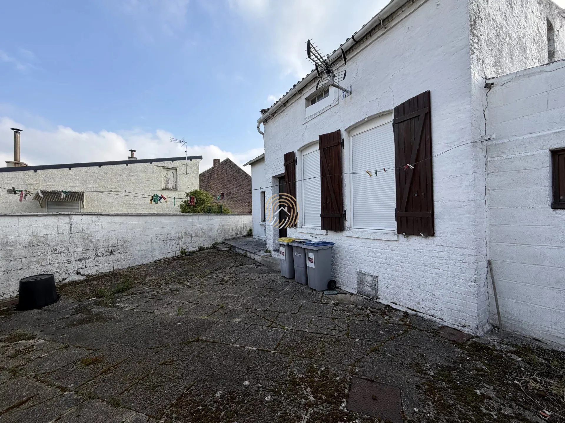 Maison semi plain-pied à rénover avec grand potentiel d'investissement à Roost-Warendin