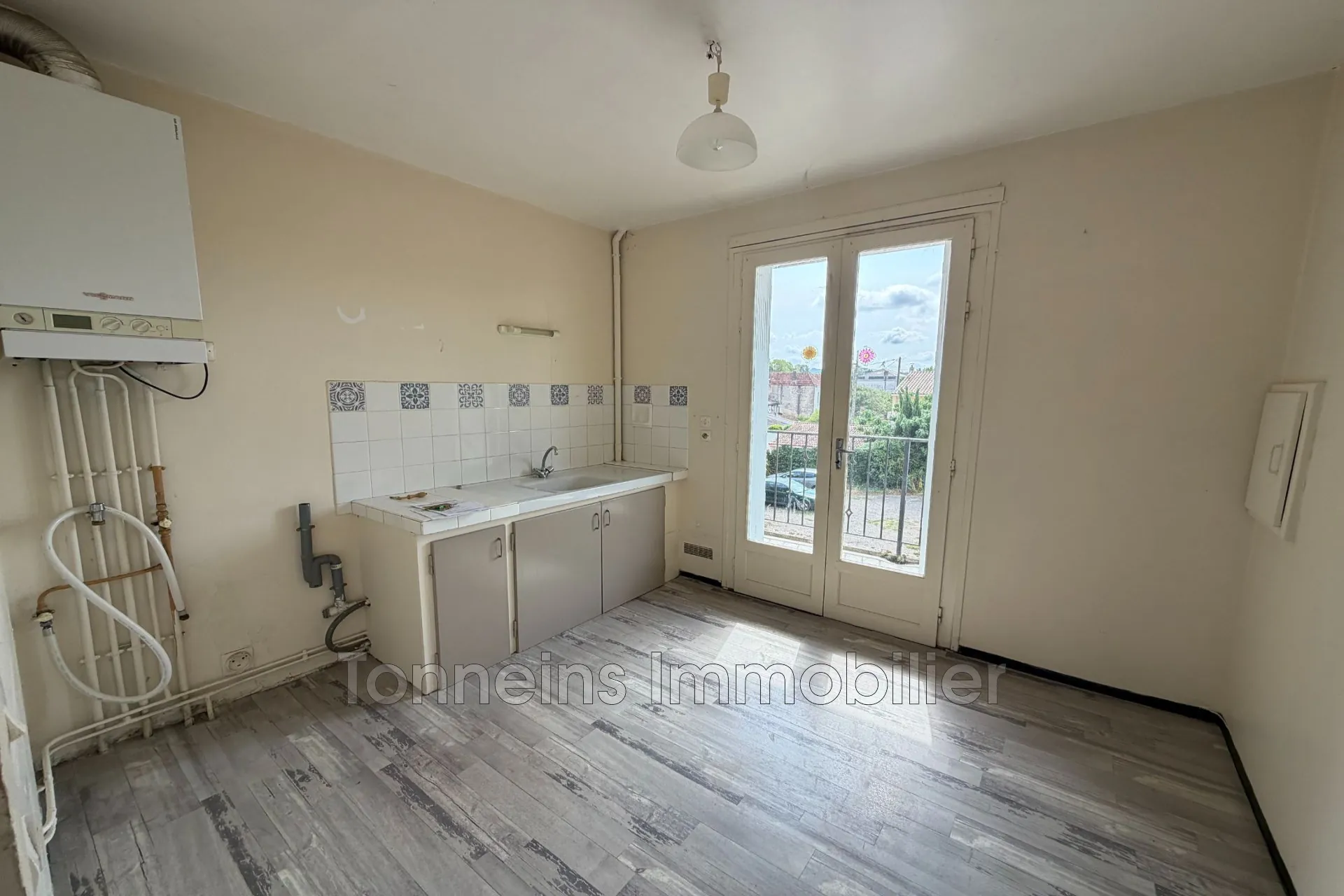 Appartement 2 pièces en centre-ville de Tonneins avec cave et balcon