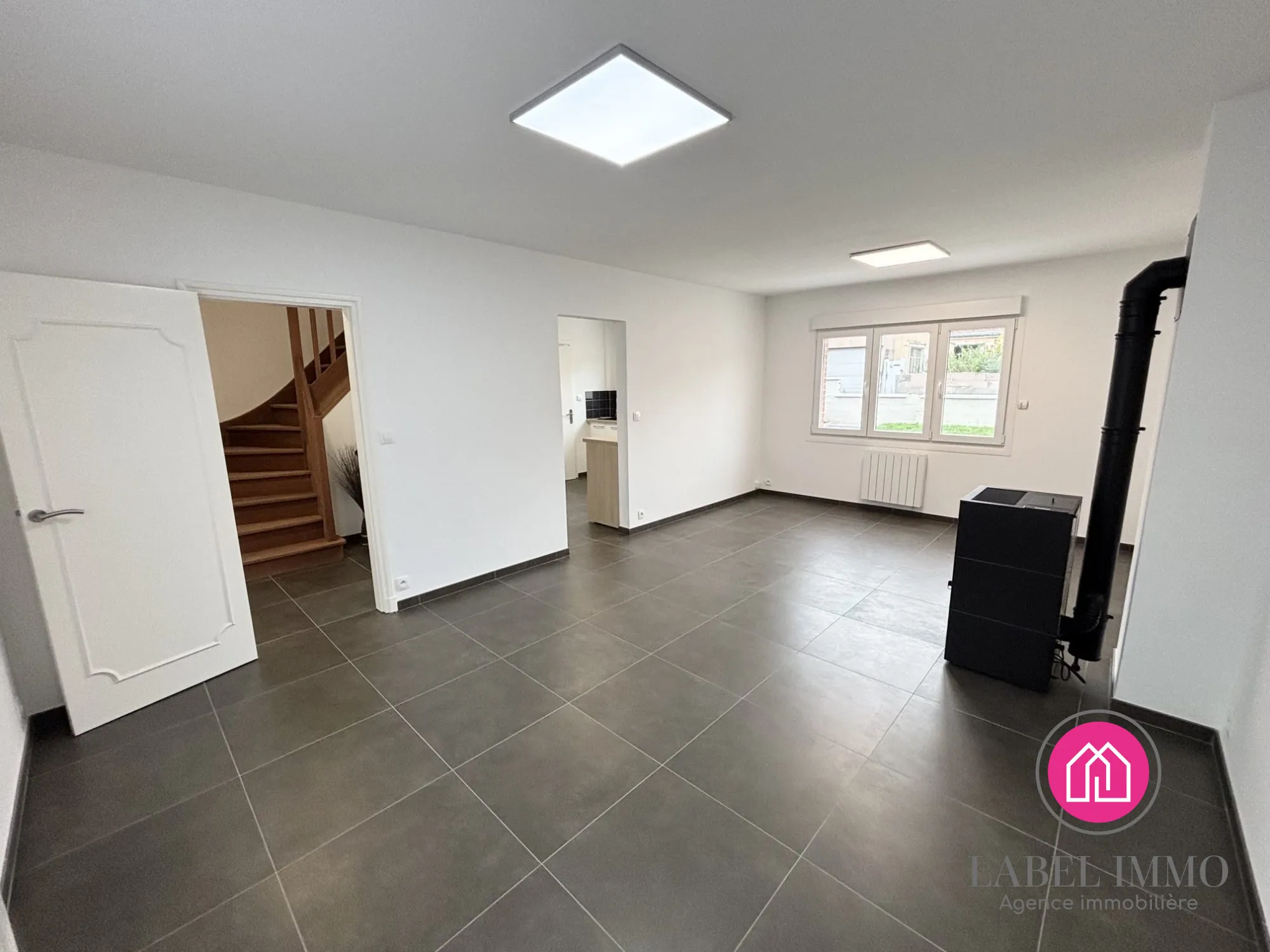 Charmante maison semi-individuelle avec garage et jardin à Douchy-les-Mines