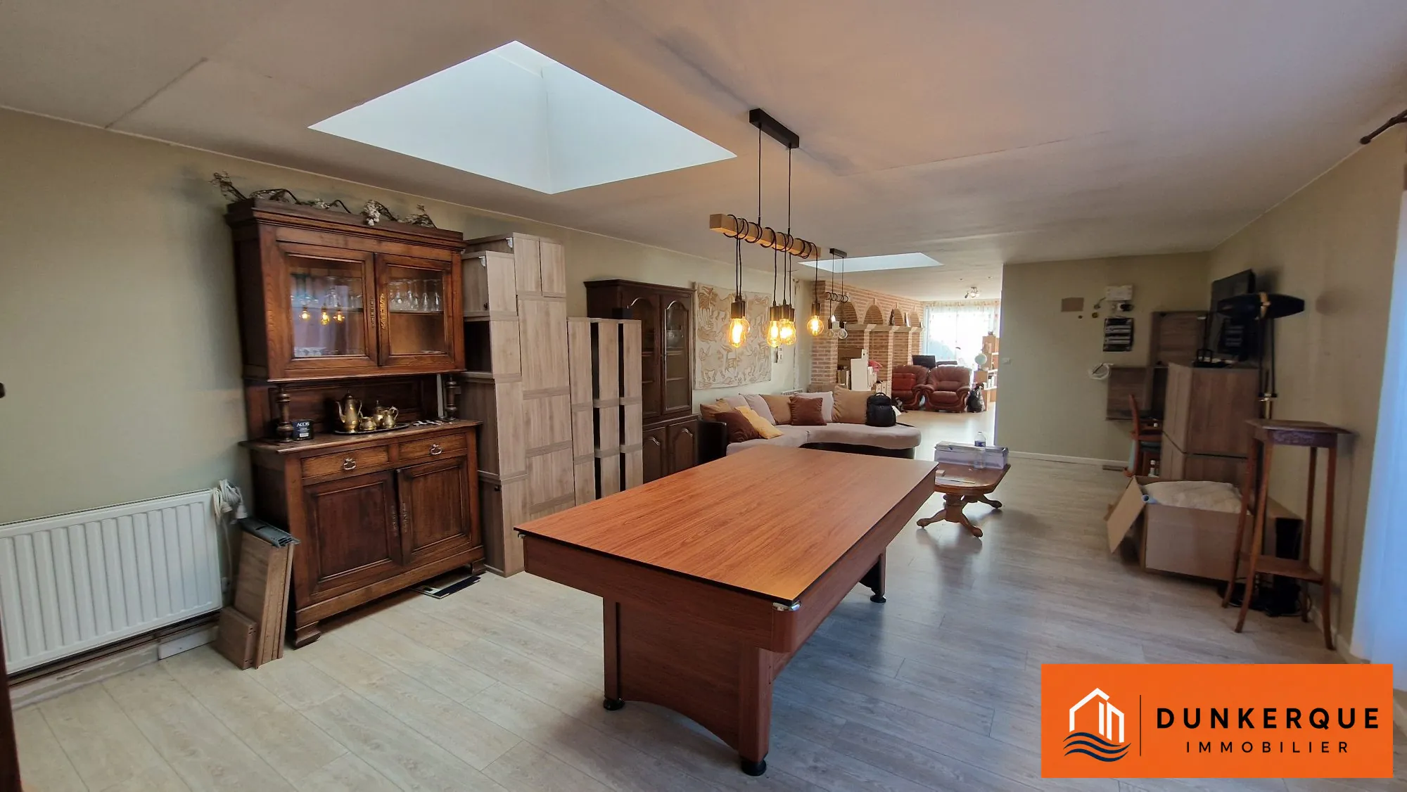 Maison à Cappelle-la-Grande de 130 m² avec parking privé et potentiel d'aménagement