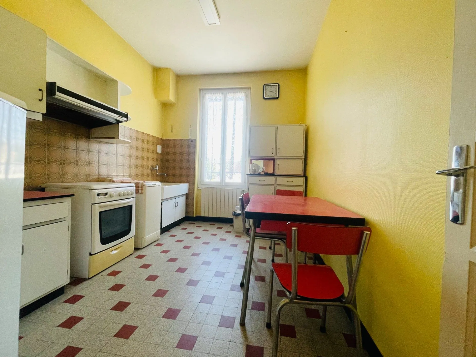 Maison de ville à Romans-sur-Isère avec garage et potentiel rénové