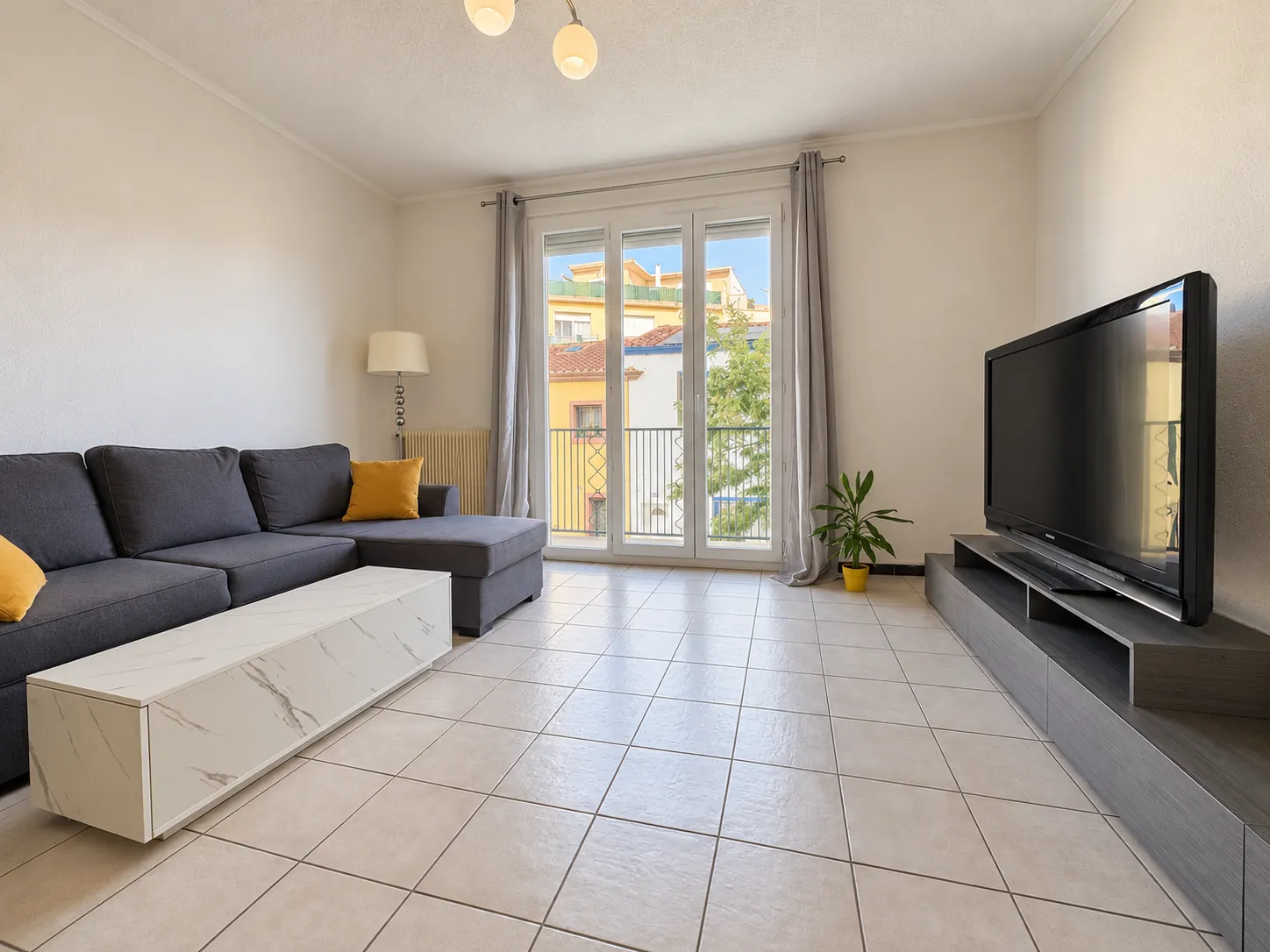Appartement F4 lumineux de 90 m² à Perpignan avec balcon et cave, proche centre-ville